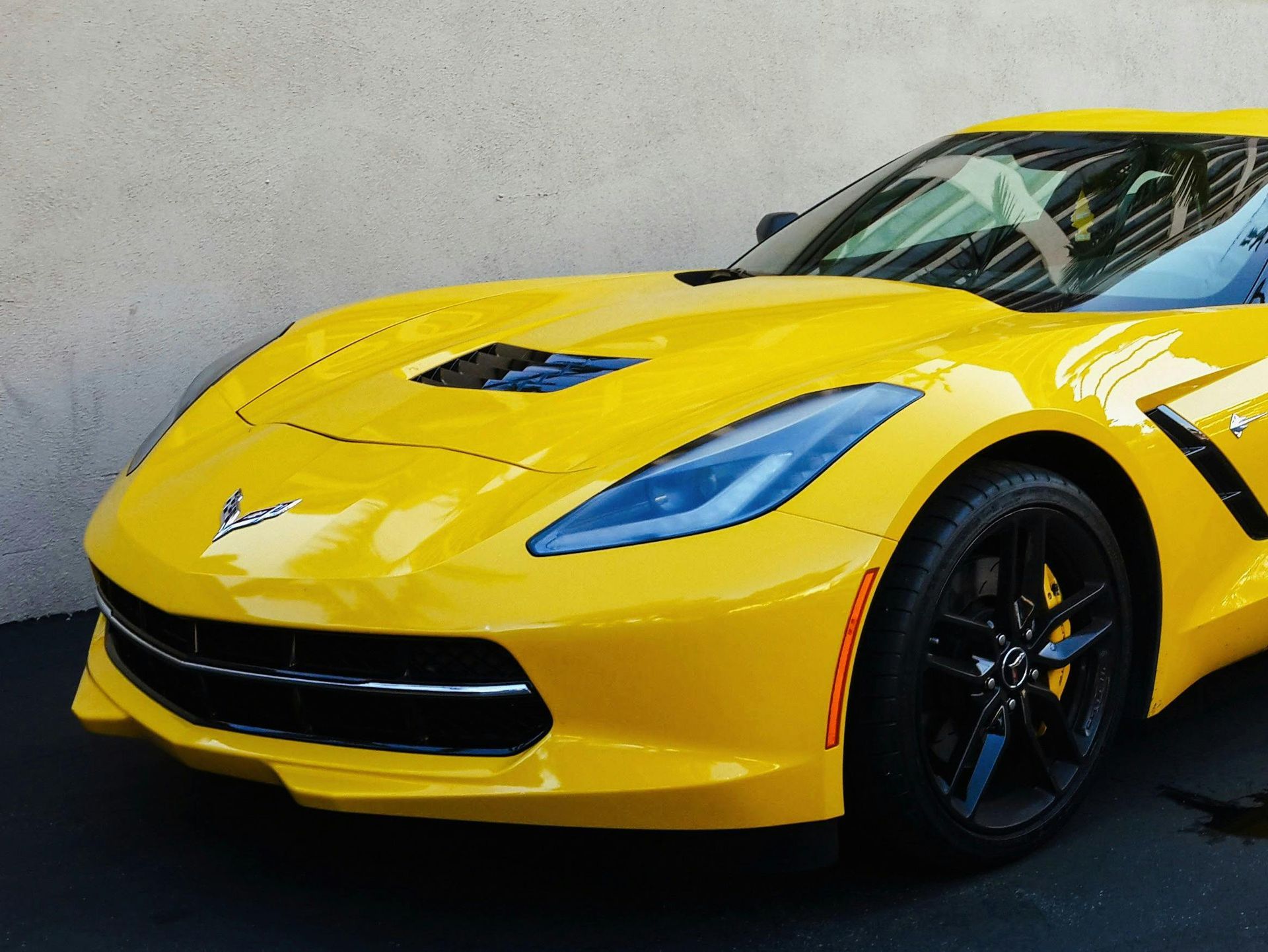 Ceramic coating protecting vehicle paint from UV and contaminants