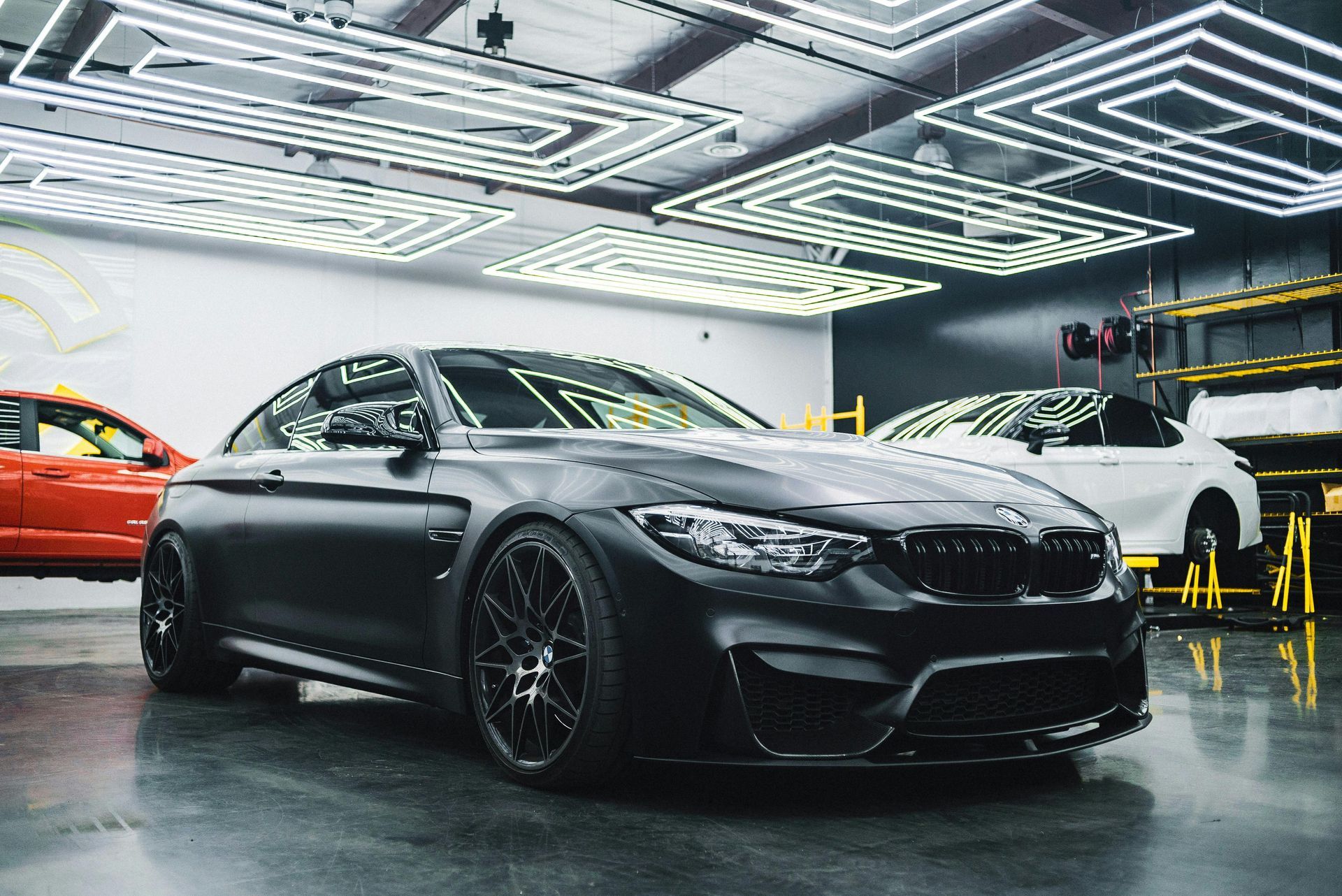 Ceramic coating protecting a black bmw with extreme gloss finish