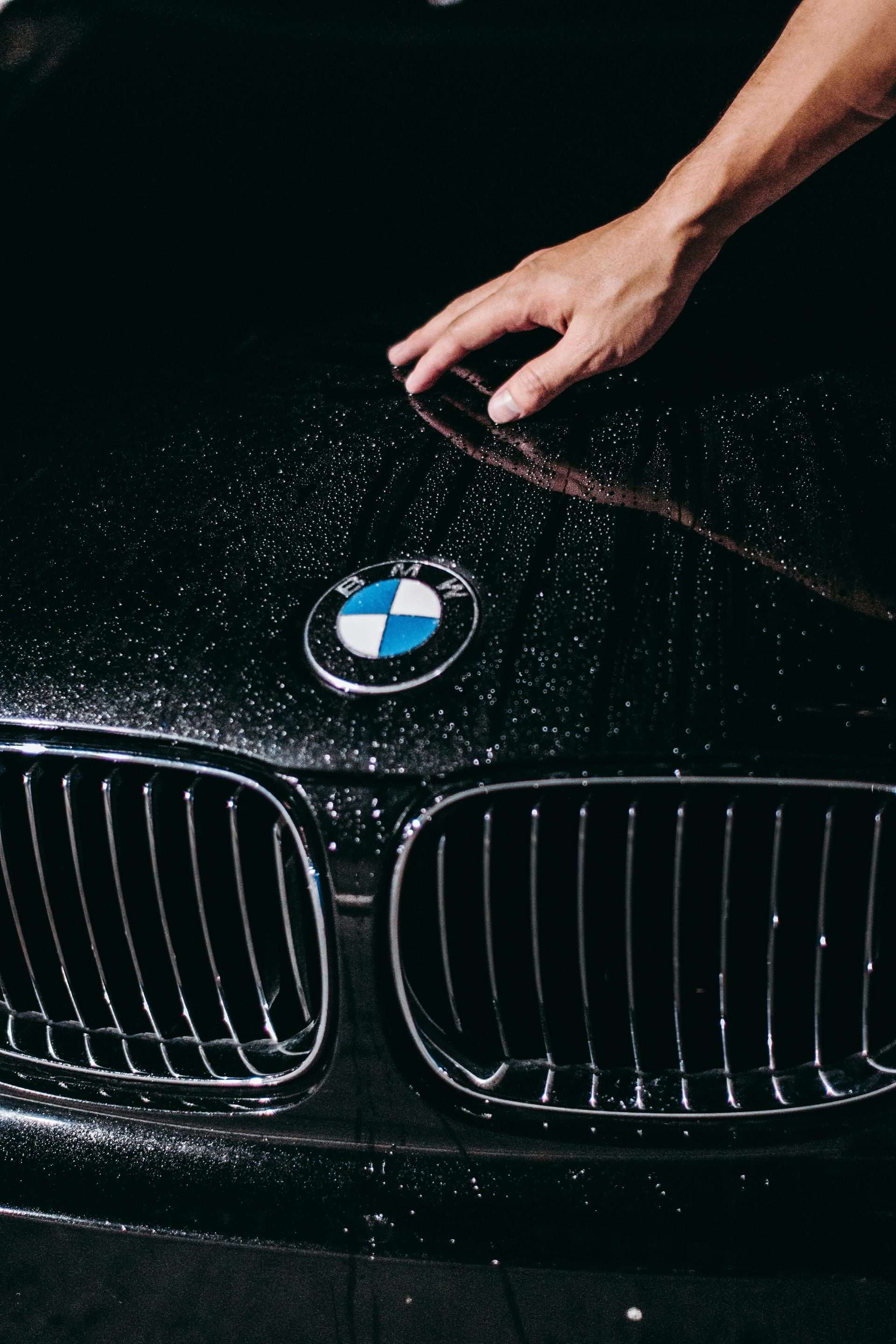 Ceramic coating application on a black BMW by RydrDie Auto Detailing