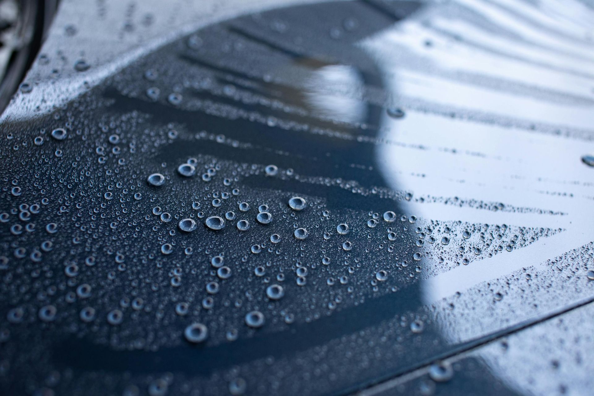 Water beading effect after ceramic coating installation on SUV