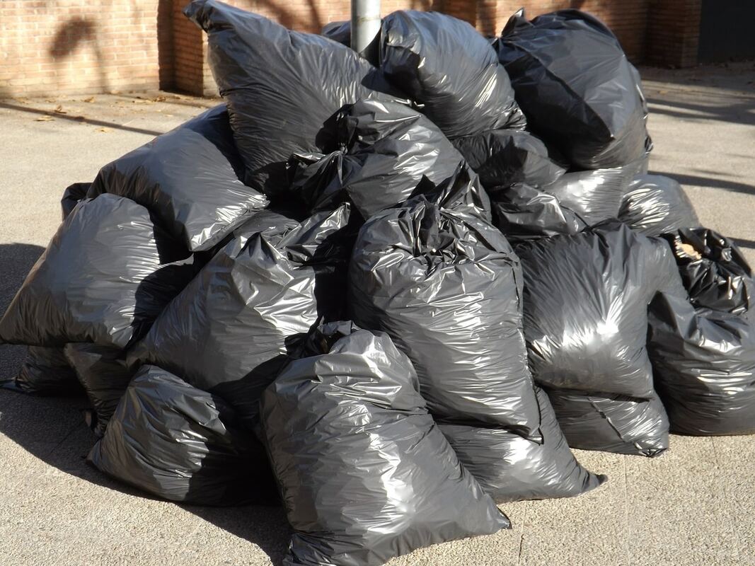 Pile of black garbage bags
