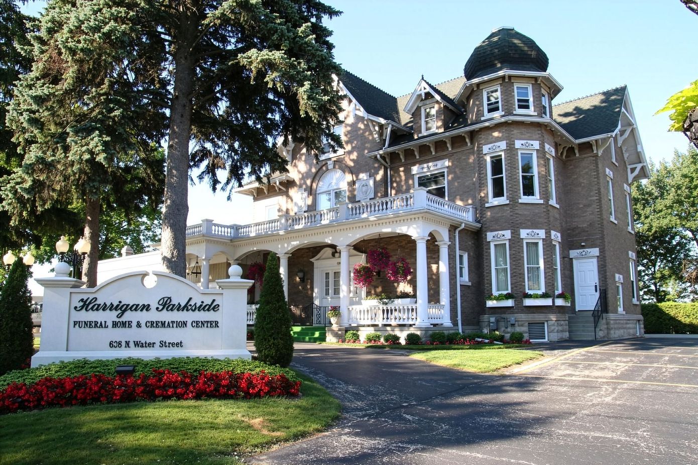 A group of people are posing for a picture together and smiling.