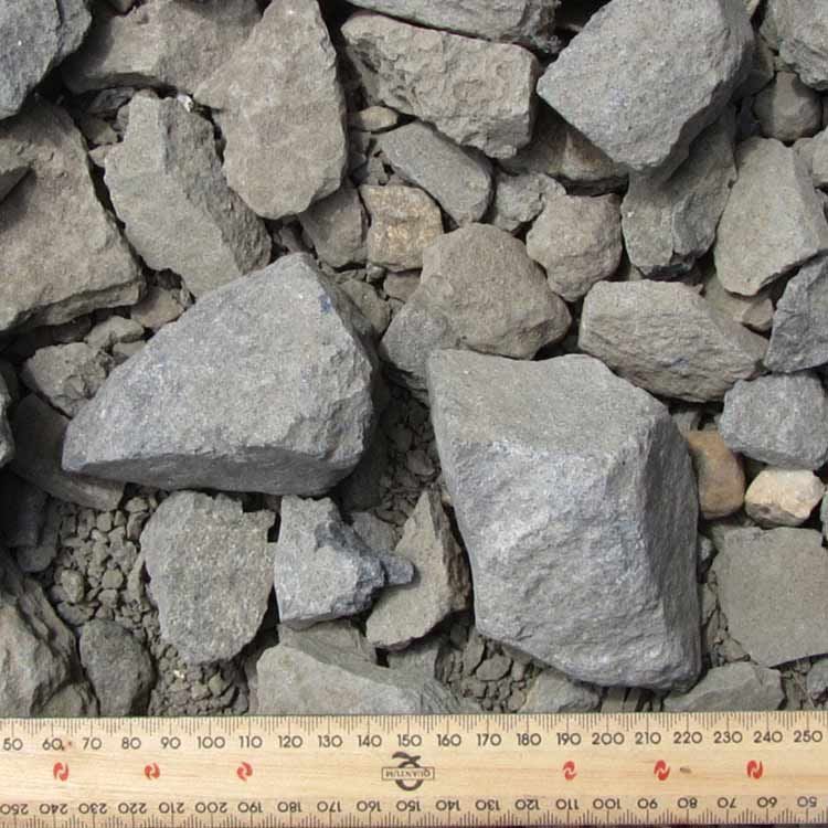 Close-up of a Pile of Gray Rocks, With a Ruler at the Bottom for Scale — Kuranda Landscape Supplies in Kuranda, QLD
