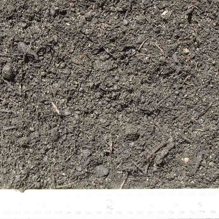 Close-up View of Dark, Textured Soil With Visible Organic Matter — Kuranda Landscape Supplies in Kuranda, QLD