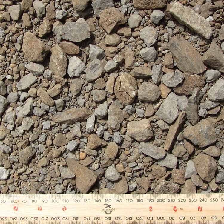 Gravel Aggregate With a Wooden Ruler for Scale — Kuranda Landscape Supplies in Kuranda, QLD