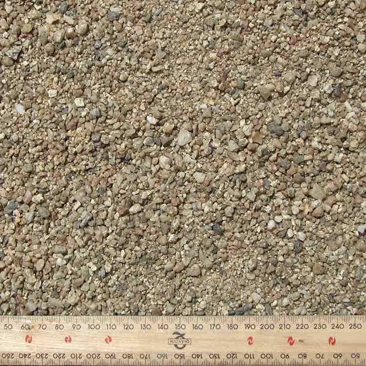 Close-up View of Beige Gravel With a Ruler, Used for Building or Landscaping — Kuranda Landscape Supplies in Kuranda, QLD