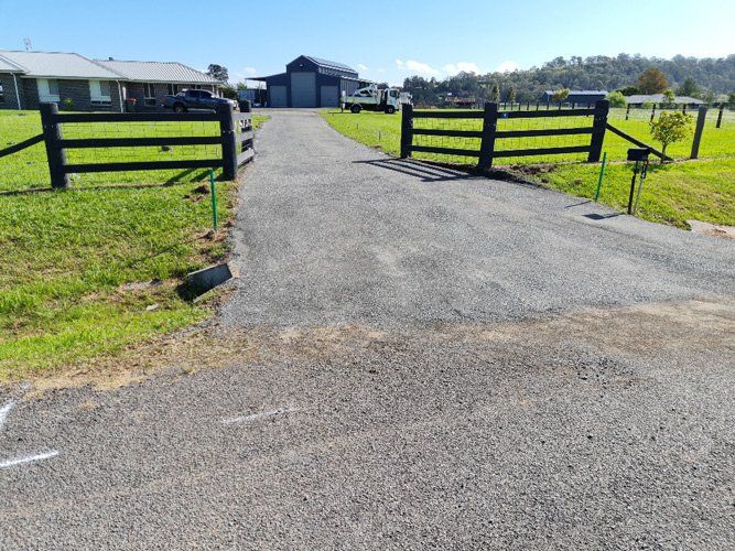 Rural Driveway Asphalt Installation — Asphalt Contractors in Newcastle, NSW