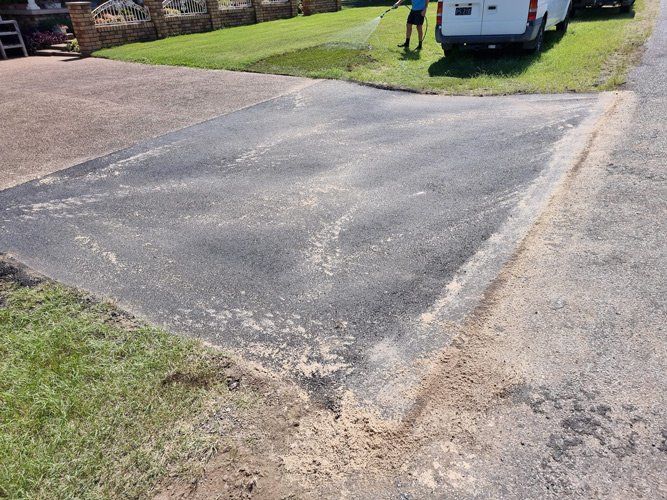 Residential Driveway Paved With Asphalt — Asphalt Surfacing on the Central Coast, NSW