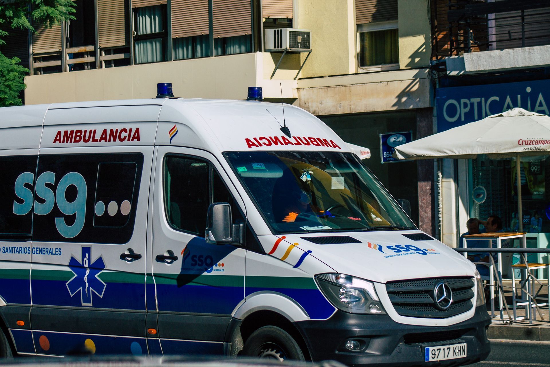 White ambulance with red