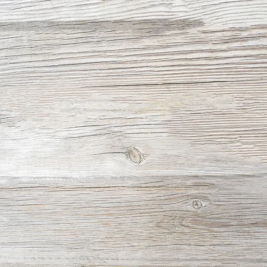 A close up of a piece of wood with a knot in it.