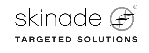 a black and white logo for skinade targeted solutions .
