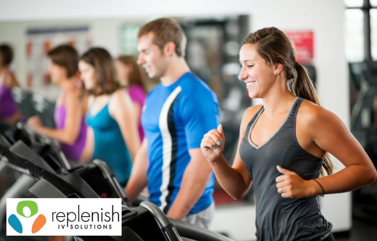 a group of people are running on treadmills in a gym sponsored by replenish ip solutions