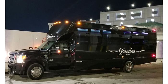 A black bus with the word jordan on it