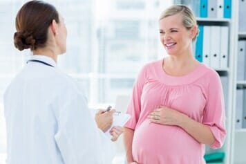 Pregnant Woman and Doctor - Pregnancy care in Ogden, UT