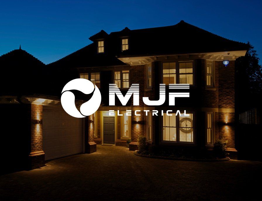 A house with the mjf electrical logo on it