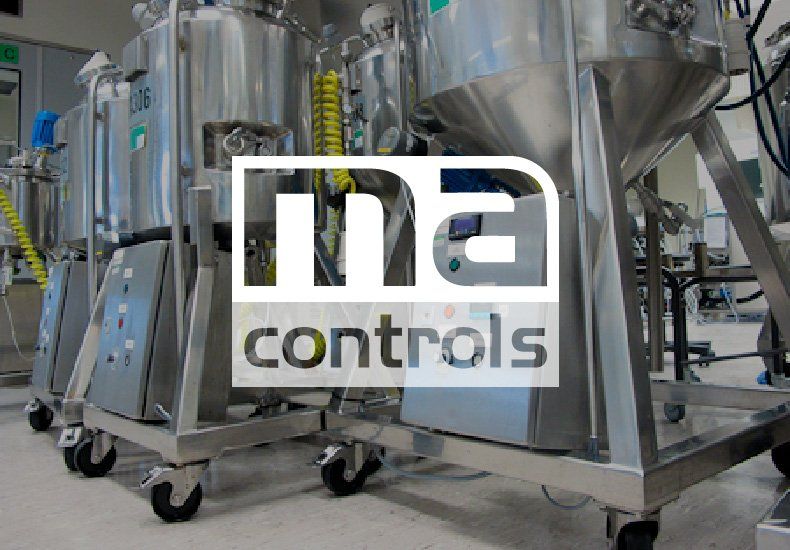 A large stainless steel container with a ma controls logo on it