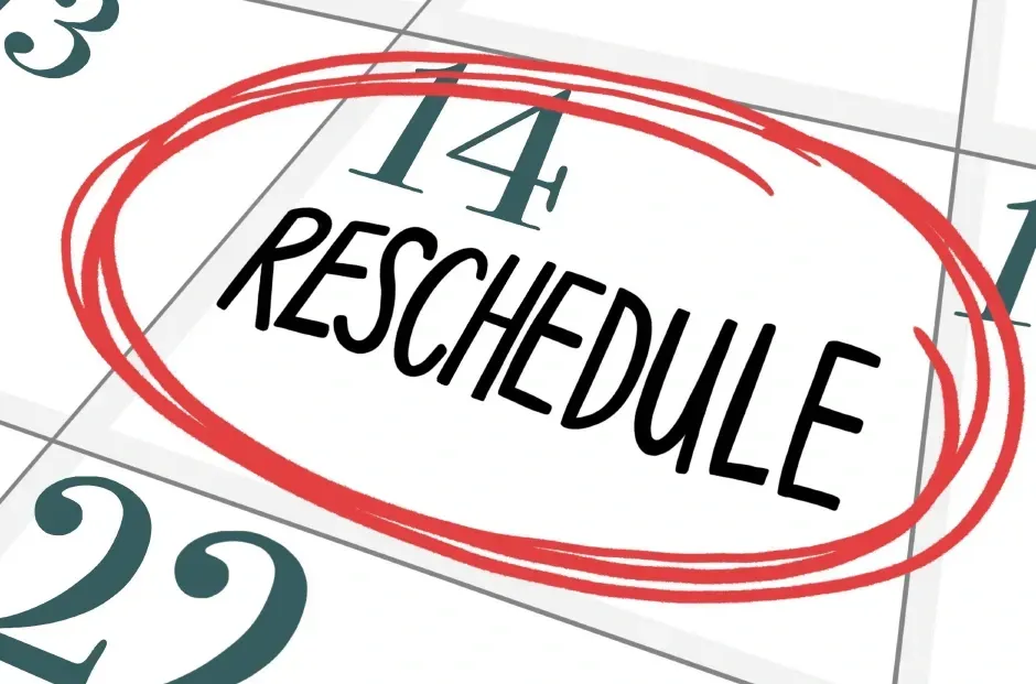 A calendar with the word reschedule circled in red