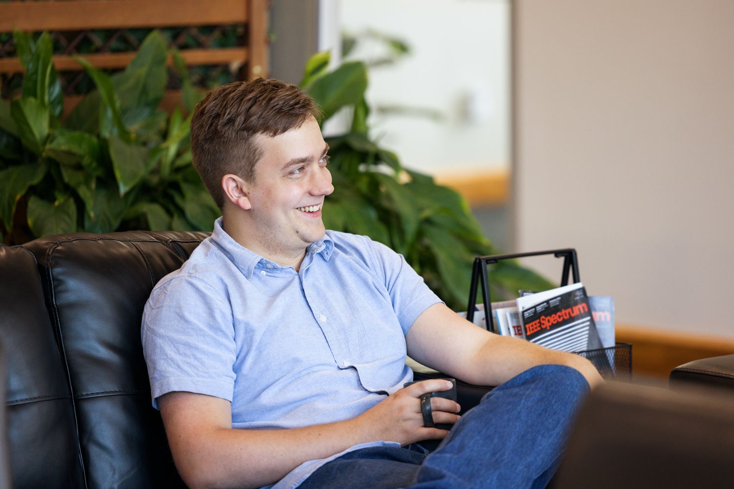Team Member interacting over coffee