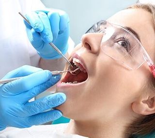 Checking The Teeth — Dental in Washington, DC