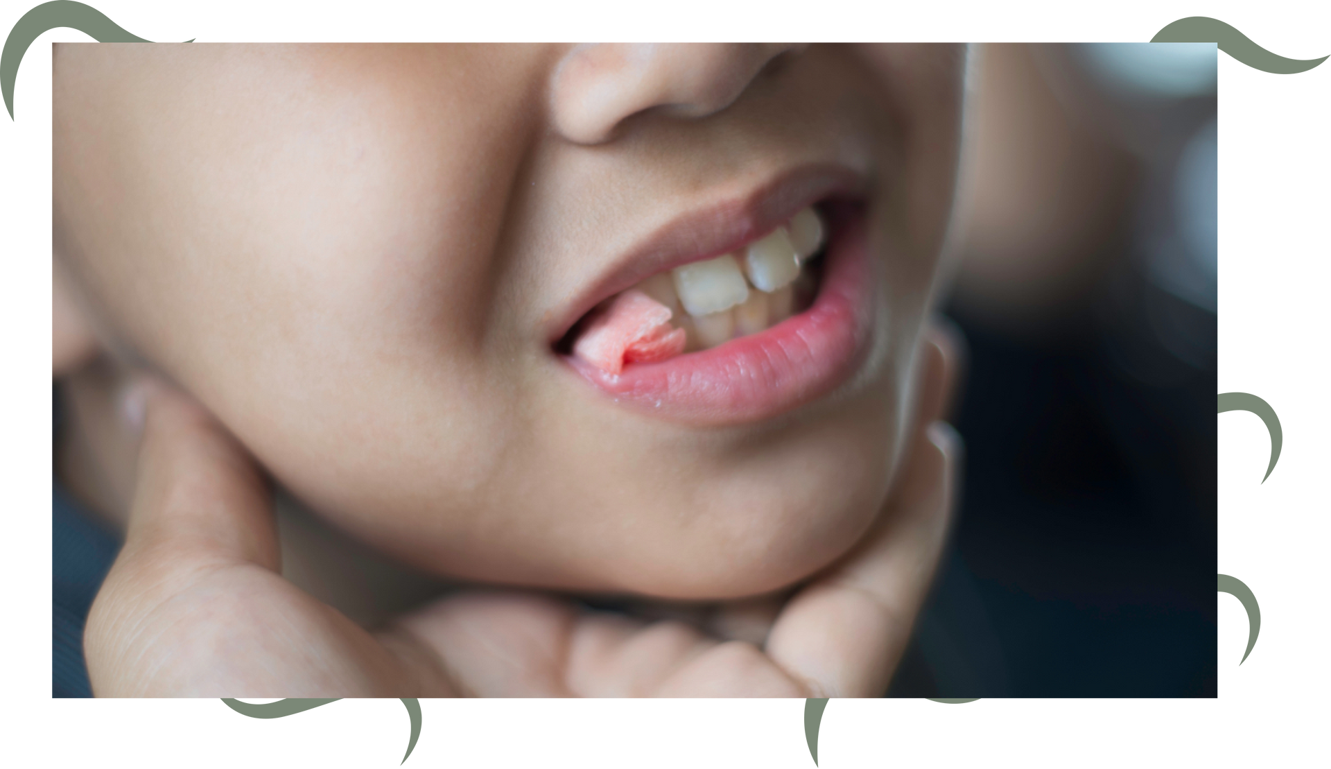 a close up of a child 's mouth with a tooth missing