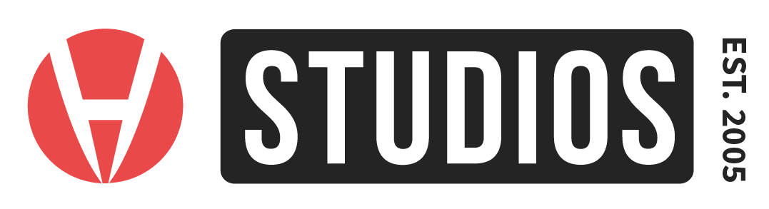 A black logo with the words studios in a rectangle and the company logo to the left of it. 