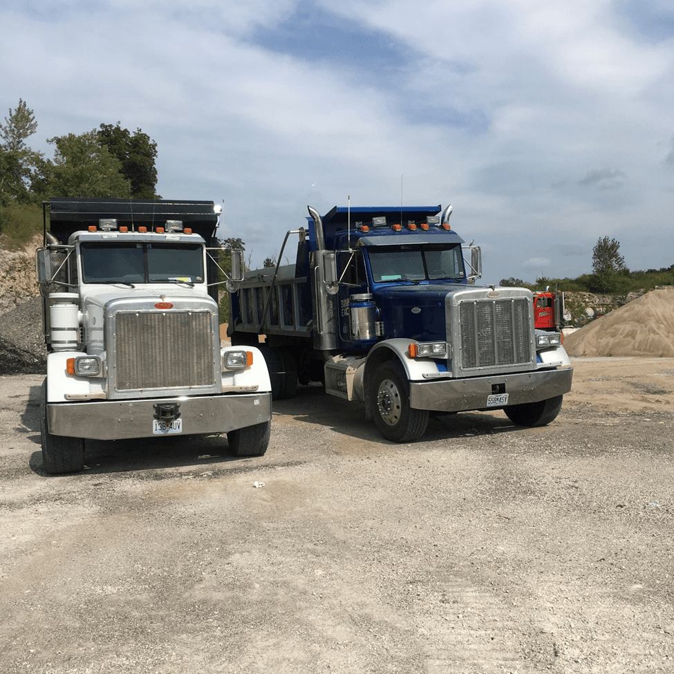Two Dump Trucks — Jefferson City, MO — Bill Binkley & Sons Excavating