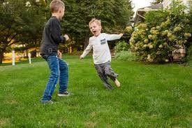 Two Kids Playing — Jefferson City, MO — Bill Binkley & Sons Excavating