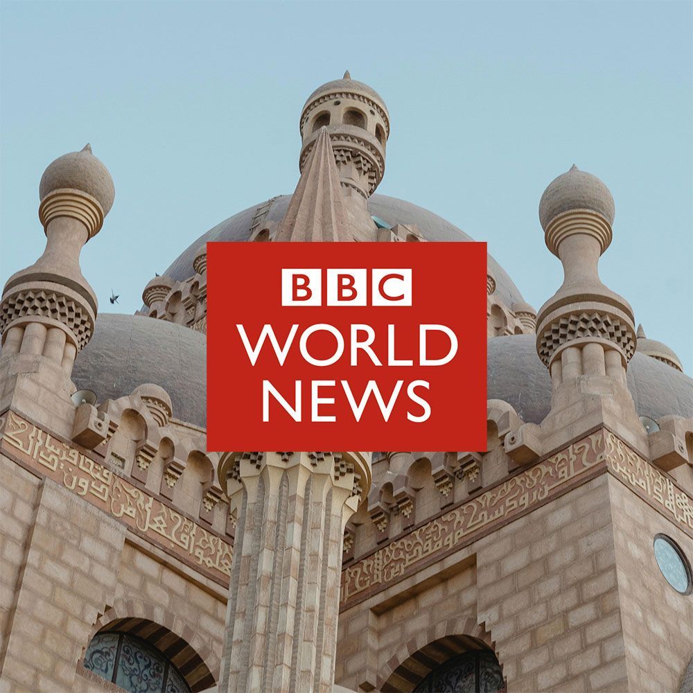 BBC World News logo superimposed on a mosque with ornate details and a blue sky.