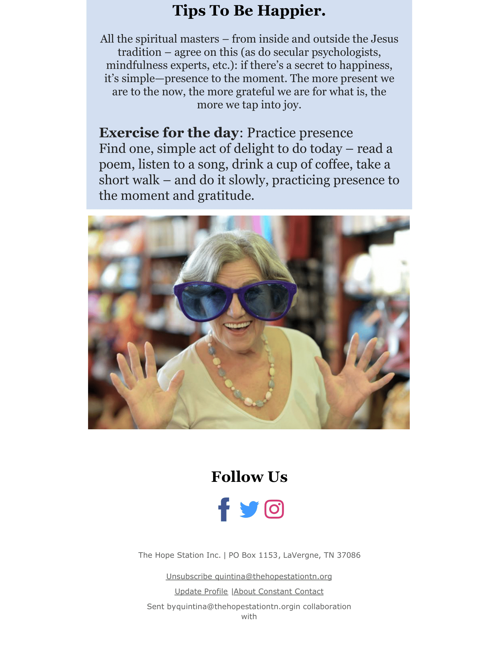 An older woman wearing sunglasses is standing in a store.