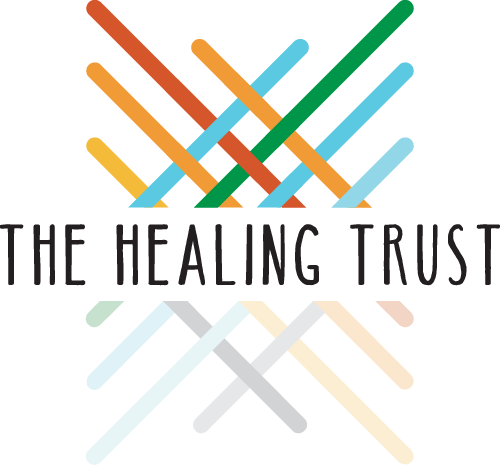 A colorful logo for the healing trust