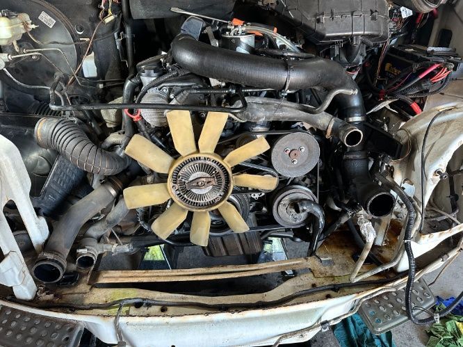 A Close Up of a Car Engine With a Fan on It — Burmec In Narrabri, NSW