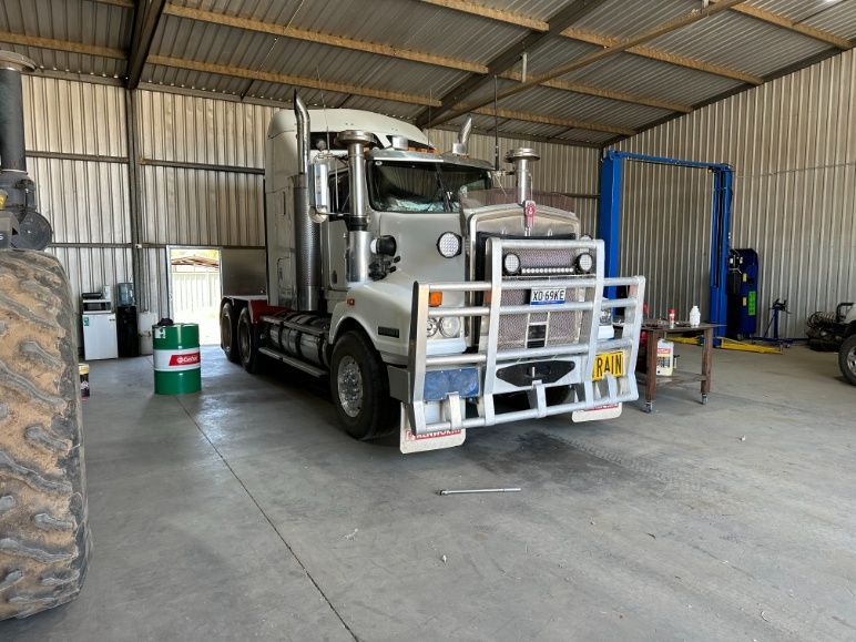 A large semi truck is parked in a garage — Burmec In Narrabri, NSW