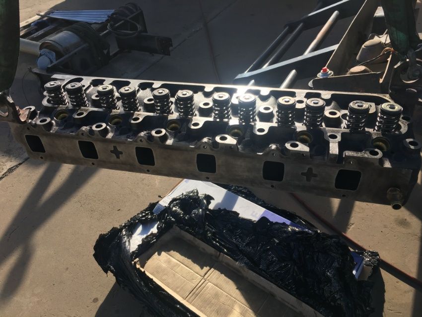 A Cylinder Head is Sitting on Top of a Cardboard Box — Burmec In Narrabri, NSW