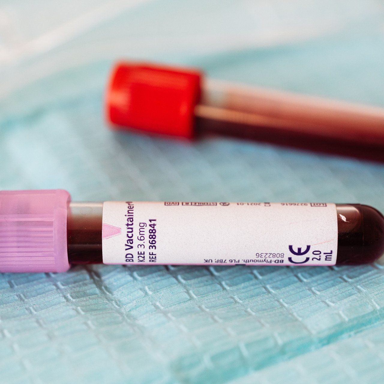 A test tube with a label that says ' vacutainer ' on it