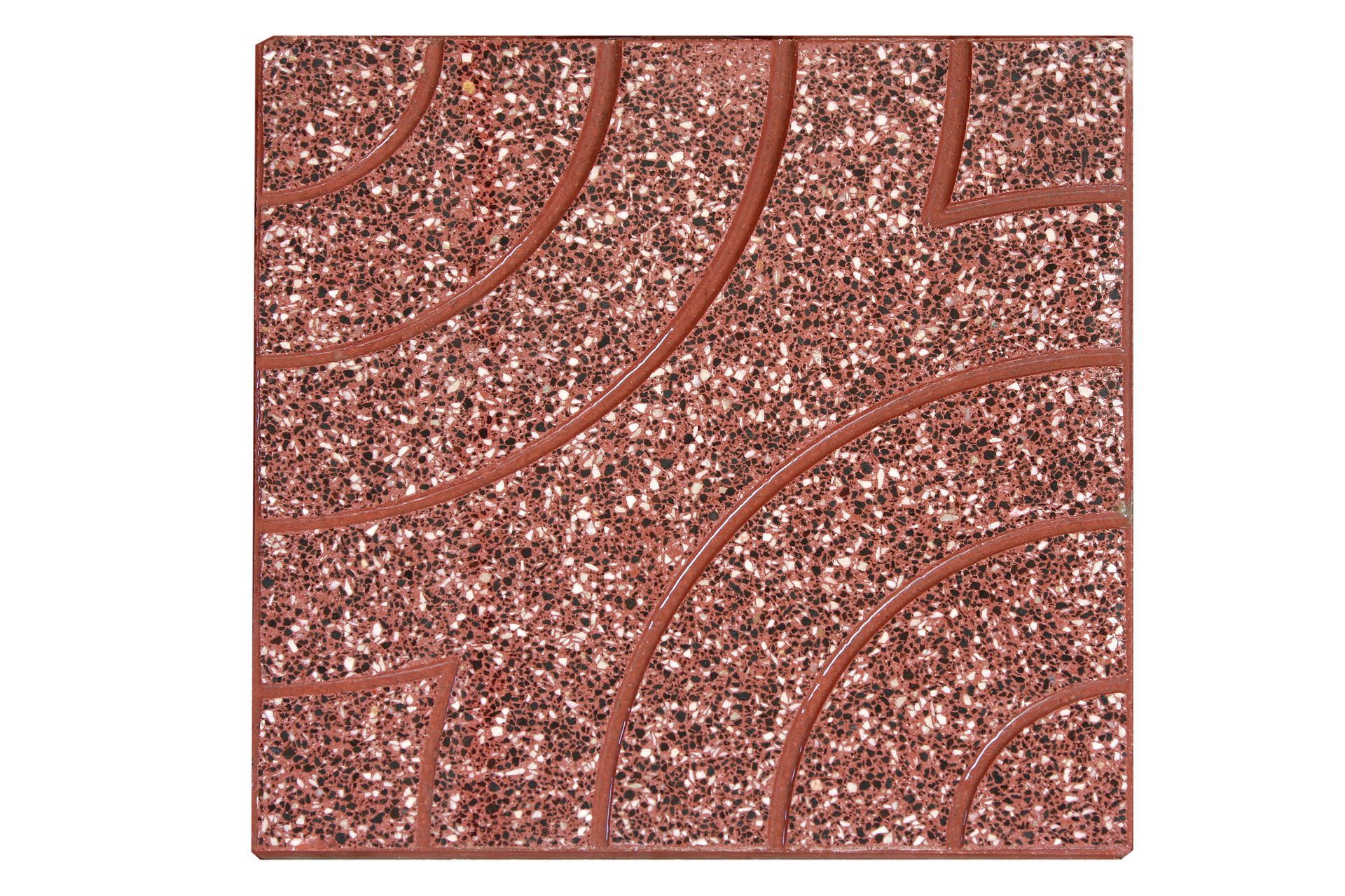 Piastrella quadrata color terracotta con superficie strutturata e punteggiata e motivo a scanalature curve.