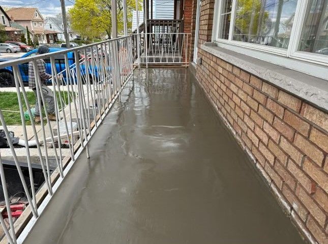 Concrete patio on second floor.