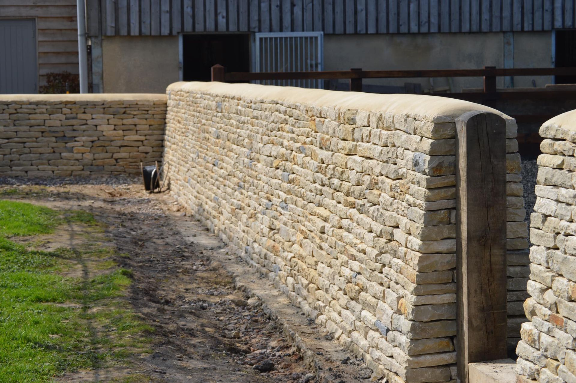 Armour stone retaining wall