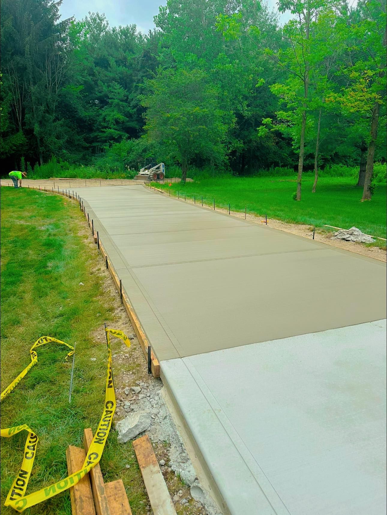 A concrete slabis being built in a backyard.