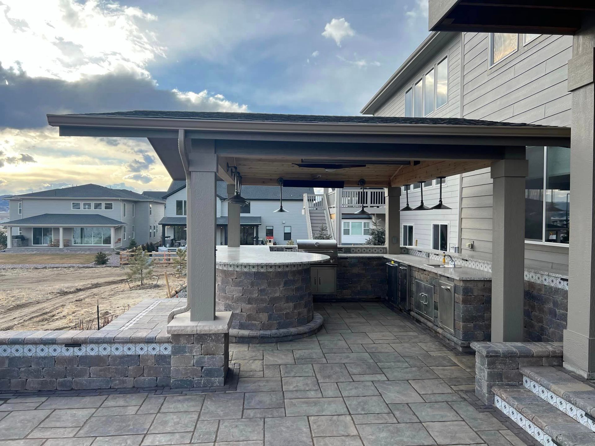 concrete patio with outdoor kitchen