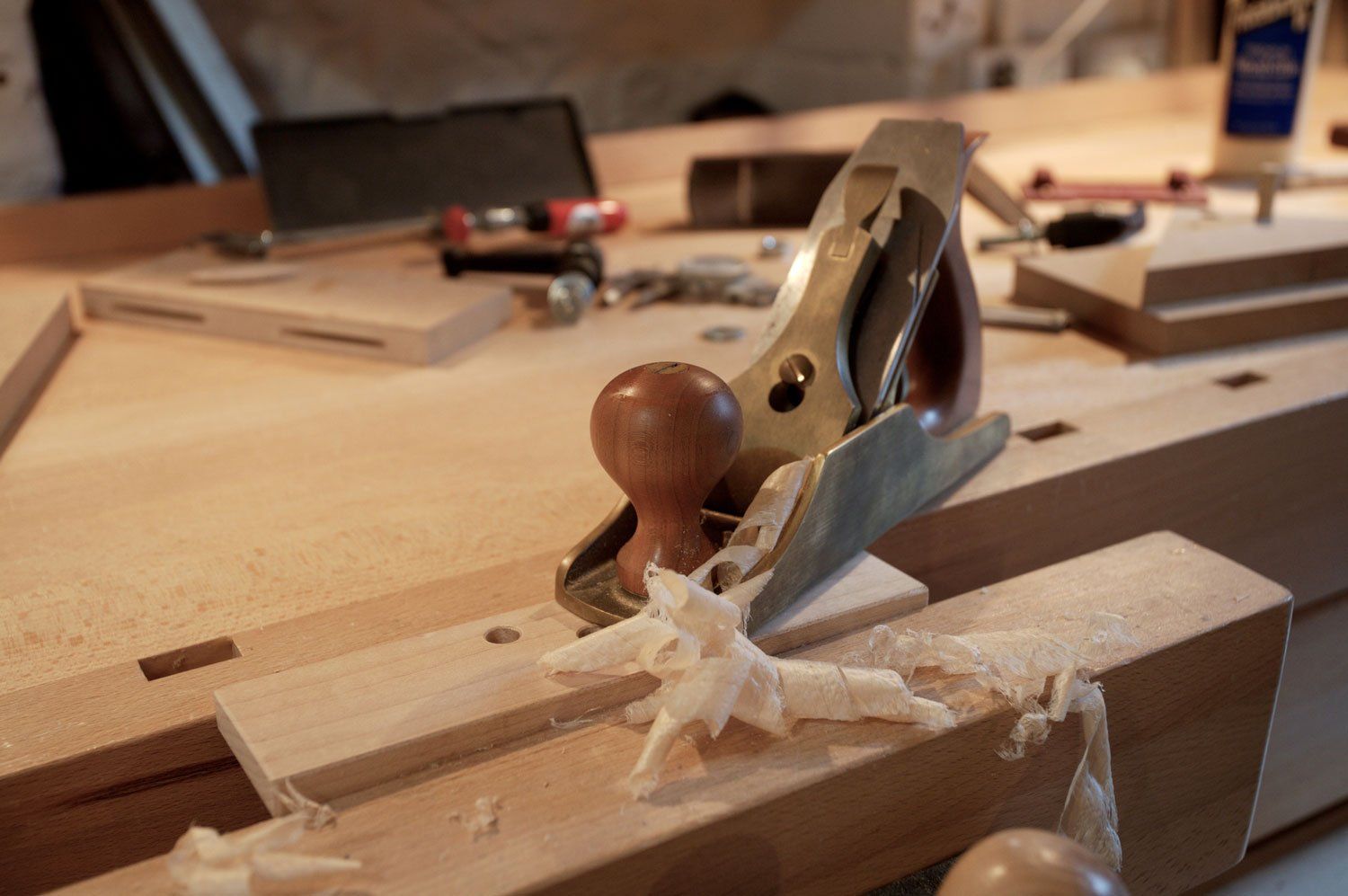 Bronze Smoothing Plane with Wood Shavings — Lowell, MI — PK Building Remodeling, LLC