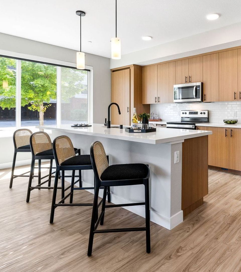 Apartment designer kitchen with waterfall island at The Hayley.
