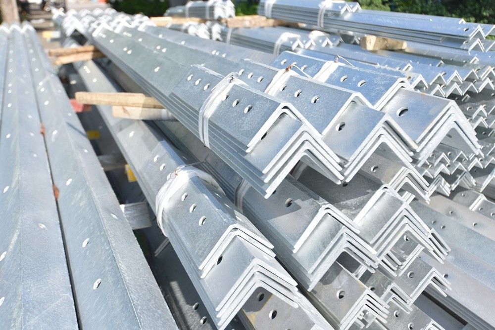 Stacks of Galvanized Steel Angle Irons, with Pre-Drilled Holes — SAE Engineering in Mount Sheridan, QLD