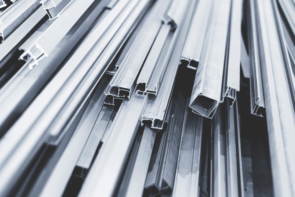Pile of Various Silver Metal Profiles and Tubes — SAE Engineering in Mount Sheridan, QLD