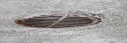 storm drain and rain