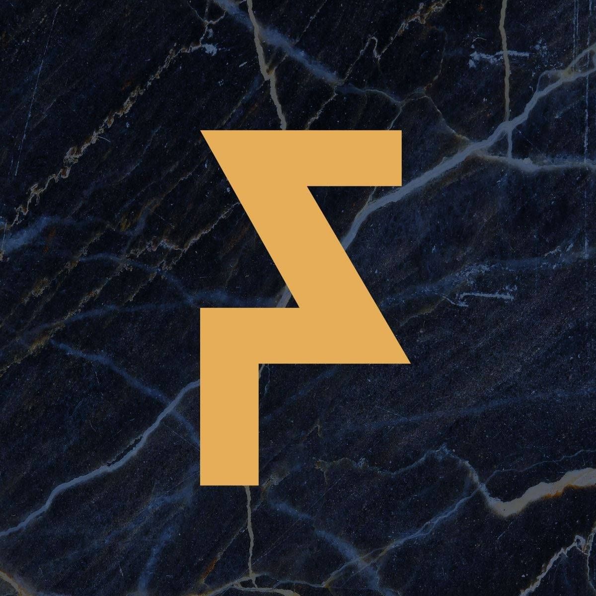 Gouden, gestileerde letter