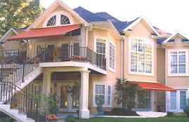 Residential Retractable Awning Experts — Large House with Awnings in Spartanburg, SC