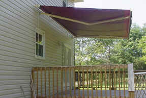 Commercial Retractable Awning Professionals — Porch with Red Retractable Awning in Spartanburg, SC