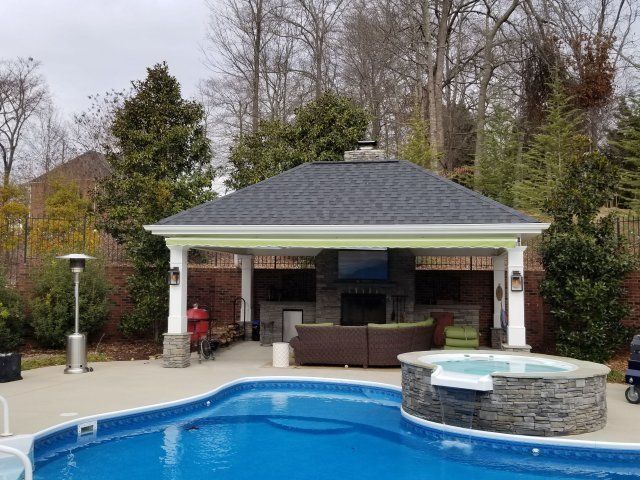 Retractable Awning Installation Experts — Pool with Shed in Spartanburg, SC