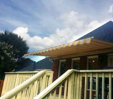 Awnings Spartanburg — Retractable Striped Awning in Spartanburg, SC