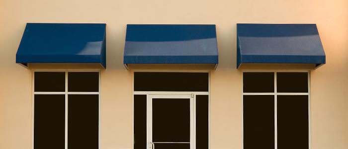 Awning Warranty — Row of Blue Window Awnings in Spartanburg,SC